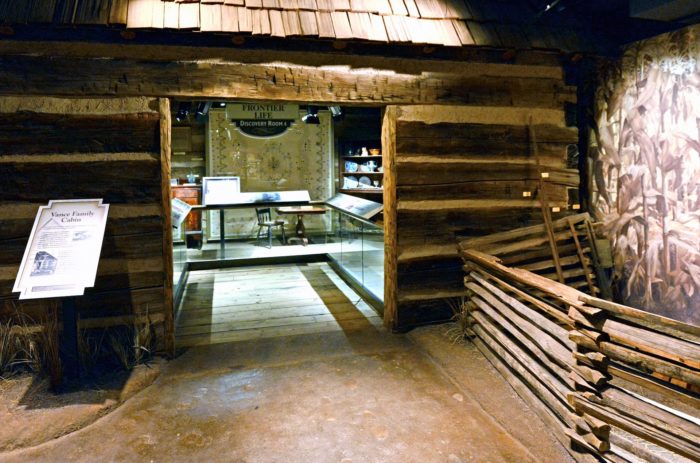 The Vance Family cabin. This log structure from Monaville served as a home and, at one time, a school, in Logan County. The cabin was disassembled and reassembled by the Barnwood Builders for the Department of Arts, Culture and History. It can be seen in Discovery Room 4 of the West Virginia State Museum.